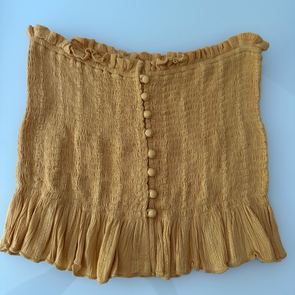 American Eagle strapless yellow medium size, with decorative buttons